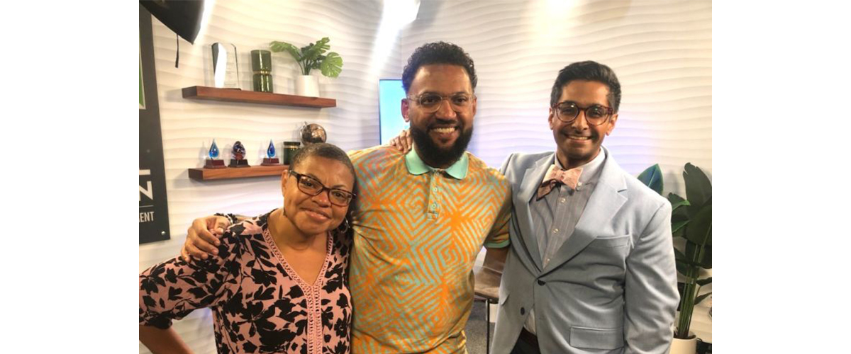 people standing in podcast studio